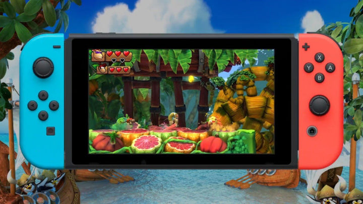 Nintendo Switch 32Gb Neon-Rot/Neon-Blau + New Super Mario Bros. U Deluxe + Donkey Kong Country: Trop