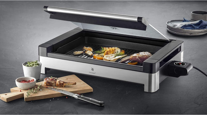 WMF Lono Elektro Tischgrill mit Glasdeckel, beschichtete Grillplatte, 2200 Watt, edelstahl matt & St