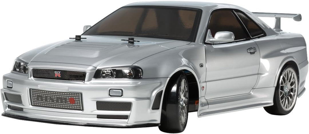 TAMIYA 300058605-1:10 RC Nismo R34 GT-R Z-Tune (TT-02D) & Carson 500500091 RC-Reflex Pro 3 Elektro S