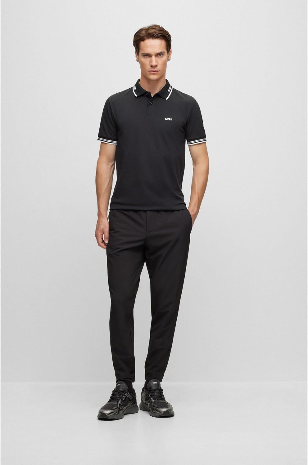 BOSS Herren Paul Curved Slim-Fit Poloshirt aus Stretch-Baumwolle mit geschwungenem Logo Schwarz S