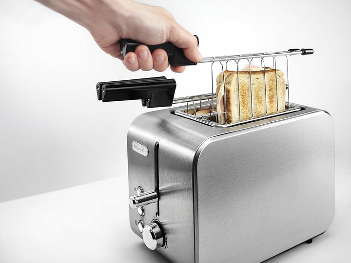 De'Longhi CTX2203.S Toaster mit Zange, stufenweise Kontrolle des Röstgrads, 3 Funktionen, Krümelschu