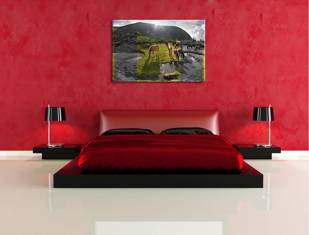 fressende Pferdeherde im Gebirge schwarz/weiss Format: 100x70 auf Leinwand, XXL riesige Bilder ferti