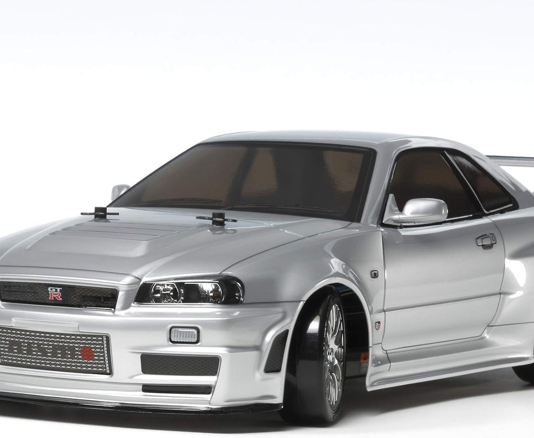TAMIYA 300058605-1:10 RC Nismo R34 GT-R Z-Tune (TT-02D) & Carson 500500091 RC-Reflex Pro 3 Elektro S