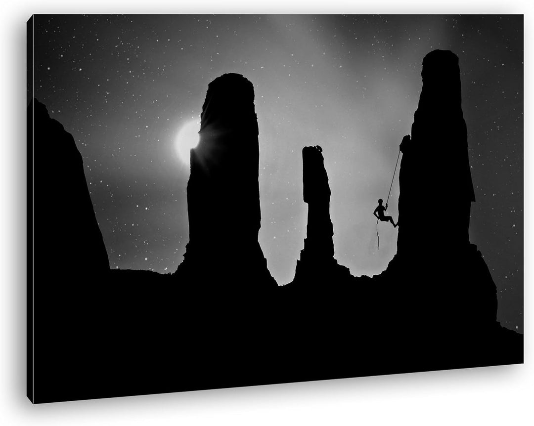 deyoli Silhouette eines Bergsteigers Format: 80x60 Effekt: Schwarz/Weiss als Leinwand, Motiv fertig