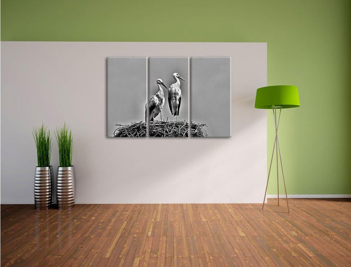 Pixxprint Zwei stolze Störche im Nest als Leinwandbild/Grösse: 3 Teilig (120x80) cm/Wandbild/Kunstdr
