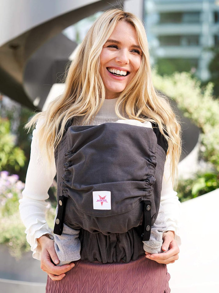 KOKADI Babytrage Flip - ergonomisch, mitwachsend und einfach - sichere Tragehilfe ab Geburt bis 15kg