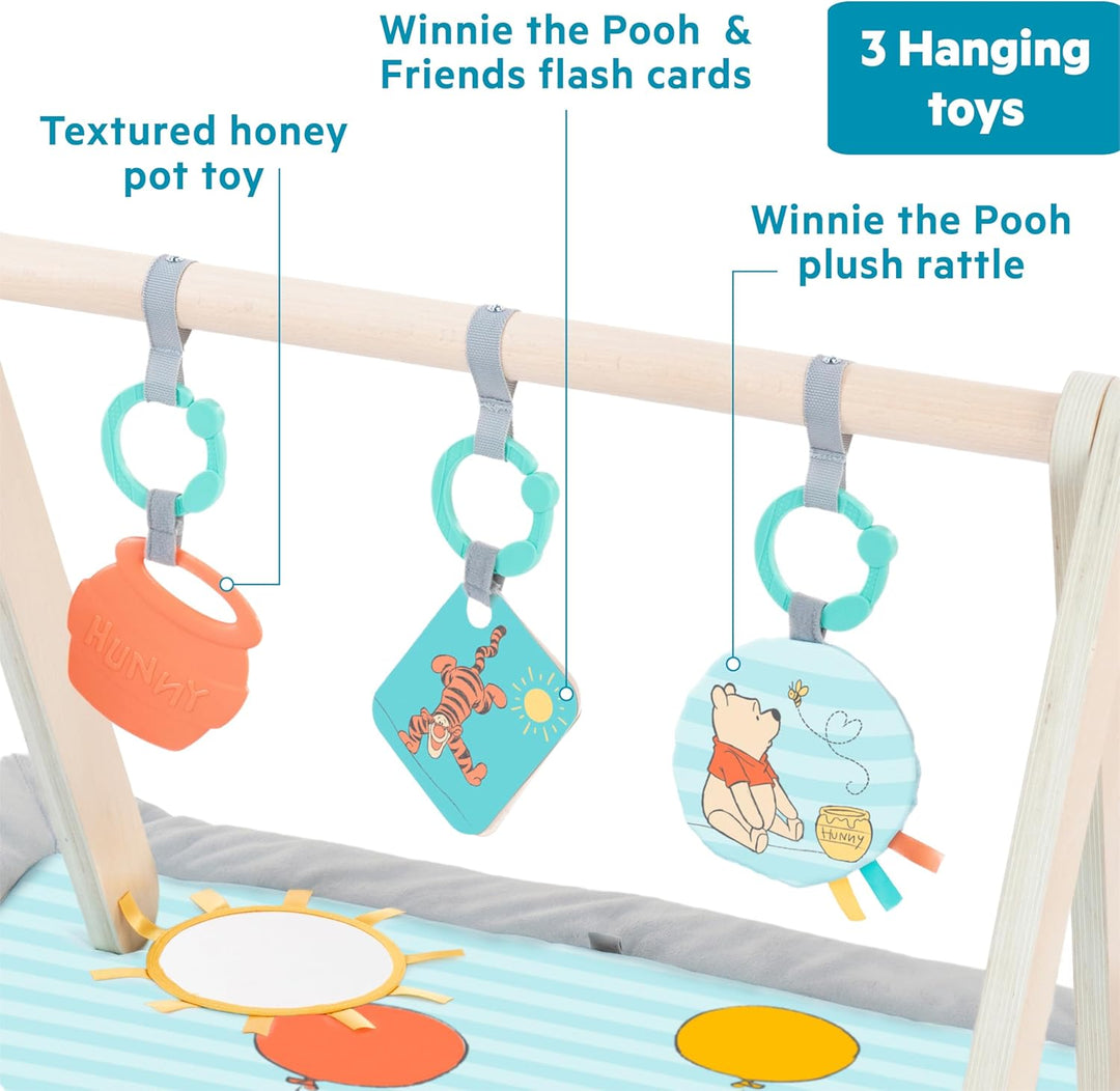 Bright Starts Disney Winnie PUUH Once Upon a Tummy Time Baby Aktivitätenmatte mit Spielzeugstange au