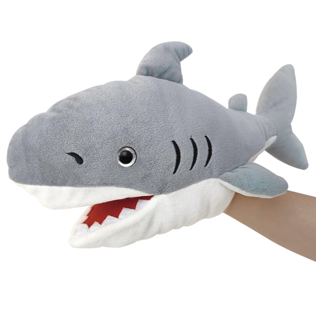 Das Leben ist eine Puppe, die mit einem bunten und beweglichen Mund gefüllt ist De-shark, De-shark