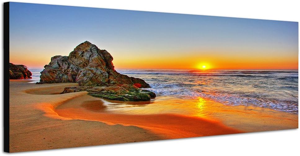 Paul Sinus Art Panoramabild auf Leinwand und Keilrahmen 150x50cm Strand Meer Sonnenaufgang Fels