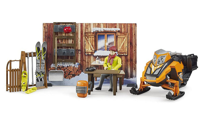 bruder 63102 - Bworld Berghütte mit Snowmobil & Figur - 1:16 Schneemobil Skifahrer Winter Spielzeug