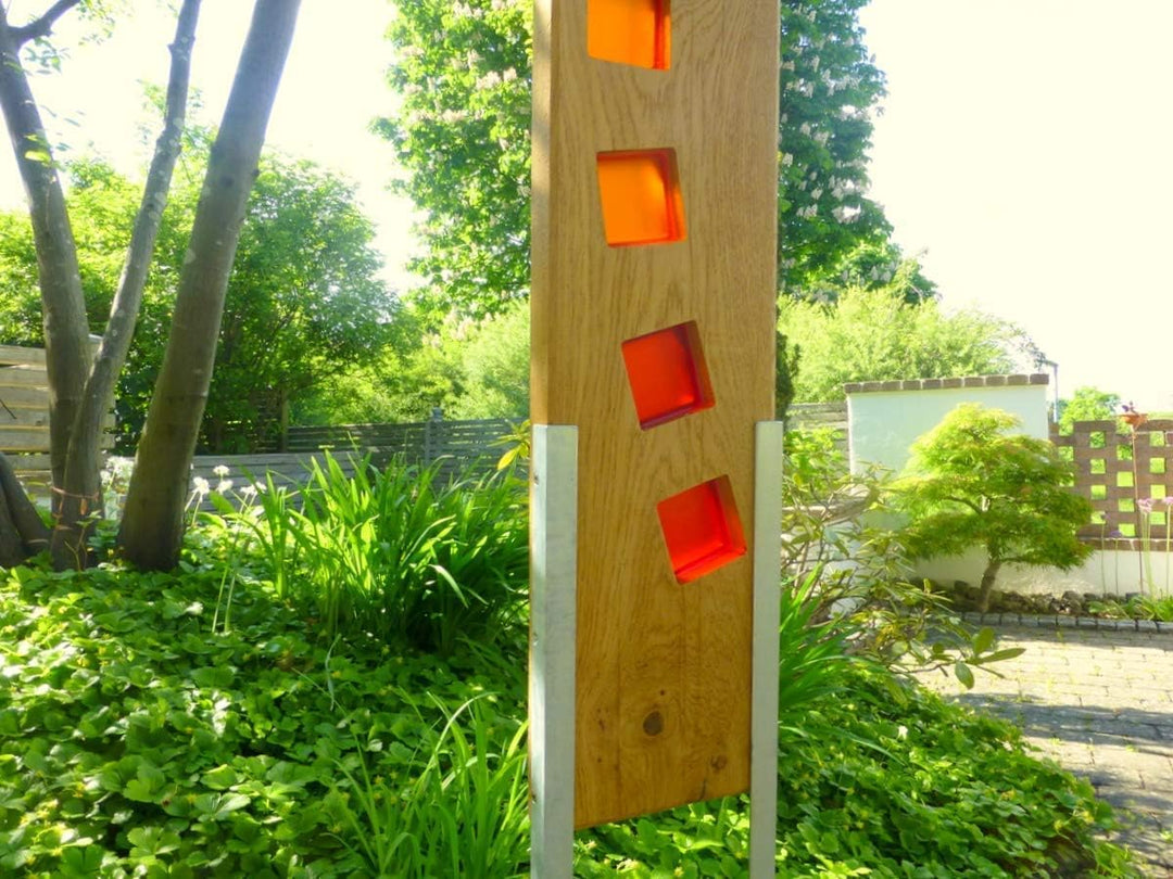 Gartenskulptur aus Holz und Glas. Gartendekoration als Unikate handgefertigt und wetterfest