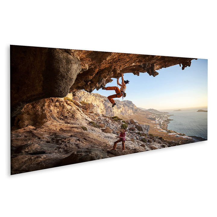 islandburner Bild auf Leinwand Junge Frau Klettert An Höhlenwand Am Meer Bilder Wandbilder Poster Le