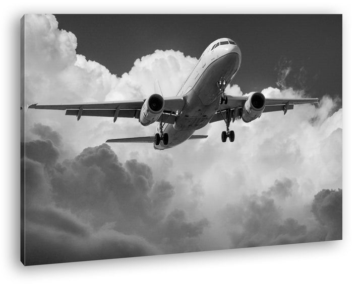 Flugzeit in den Wolken Effekt: Schwarz/Weiss im Format: 80x60 als Leinwandbild, Motiv fertig gerahmt