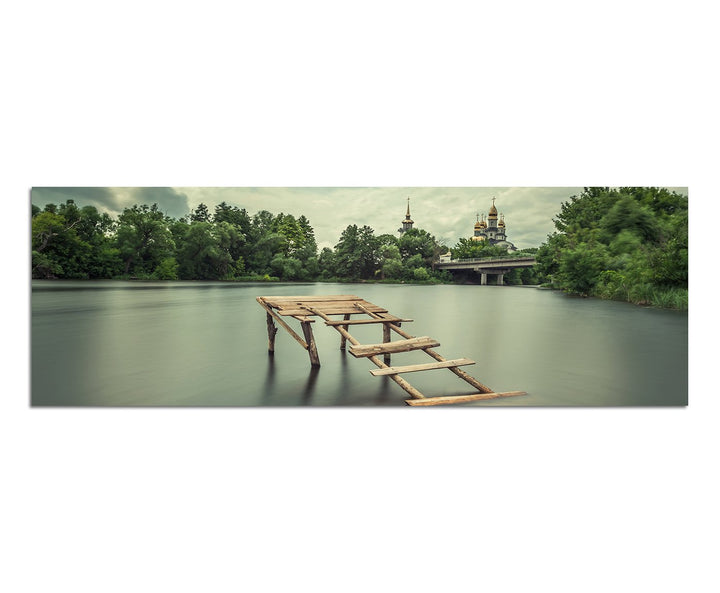 Paul Sinus Art Panoramabild auf Leinwand und Keilrahmen 150x50cm See Holzsteg Bäume Kirche Himmel