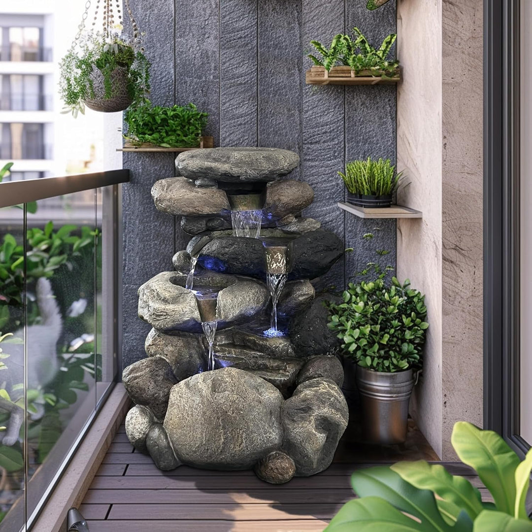 Köhko Springbrunnen Kieselstein Gartenbrunnen in Naturstein-Optik mit 4X LED Beleuchtung Höhe=68 cm