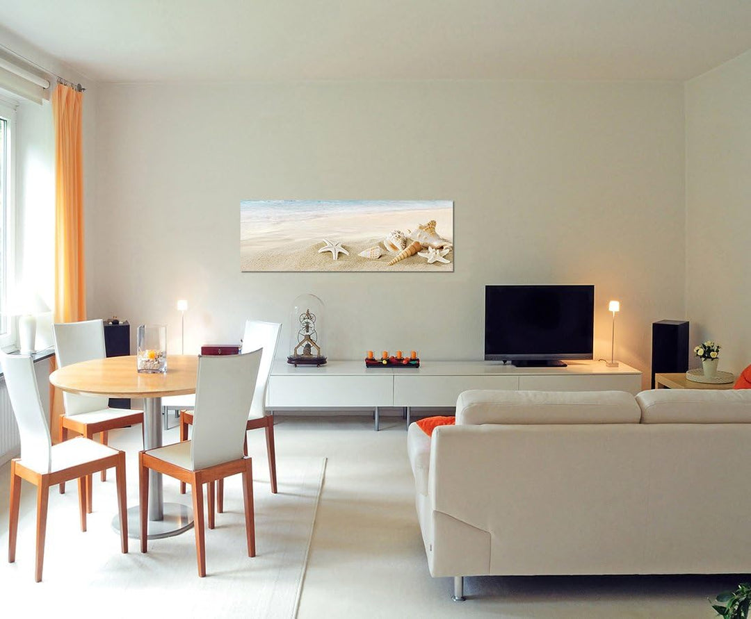 Paul Sinus Art Panoramabild auf Leinwand und Keilrahmen 150x50cm Sandstrand Meer Muscheln Schneckenh