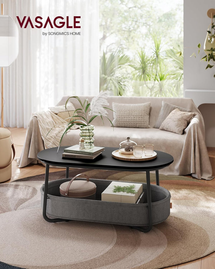 VASAGLE Couchtisch oval, Tisch mit Stauraum, Beistelltisch, Wohnzimmertisch mit Korb aus Stoff, mode