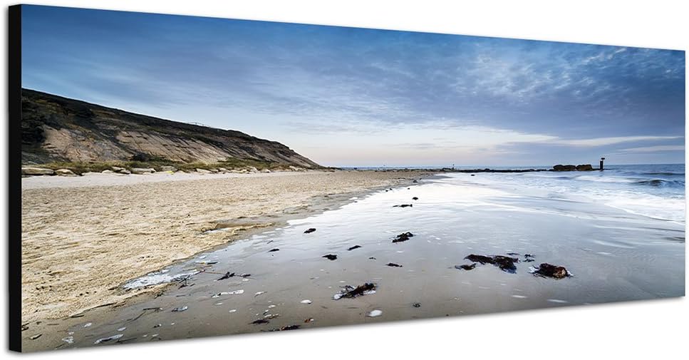 Paul Sinus Art Panoramabild auf Leinwand und Keilrahmen 150x50cm Endland Strand Felsen Meer Morgengr