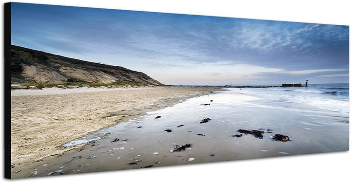 Paul Sinus Art Panoramabild auf Leinwand und Keilrahmen 150x50cm Endland Strand Felsen Meer Morgengr
