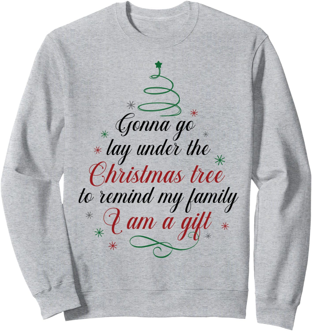 Legen Sie sich unter den Weihnachtsbaum, um die Familie daran zu erinnern, dass ich ein Geschenk bin