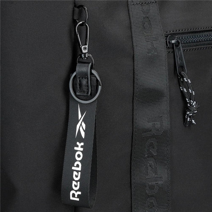 Reebok Damen Elsie Gepäck- Kuriertasche Bandolera Plana Schwarz, Bandolera Plana Schwarz