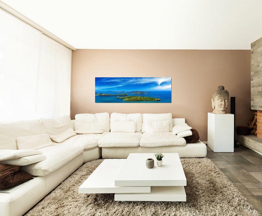 Paul Sinus Art Panoramabild auf Leinwand und Keilrahmen 150x50cm Meer Inseln Wolkenschleier