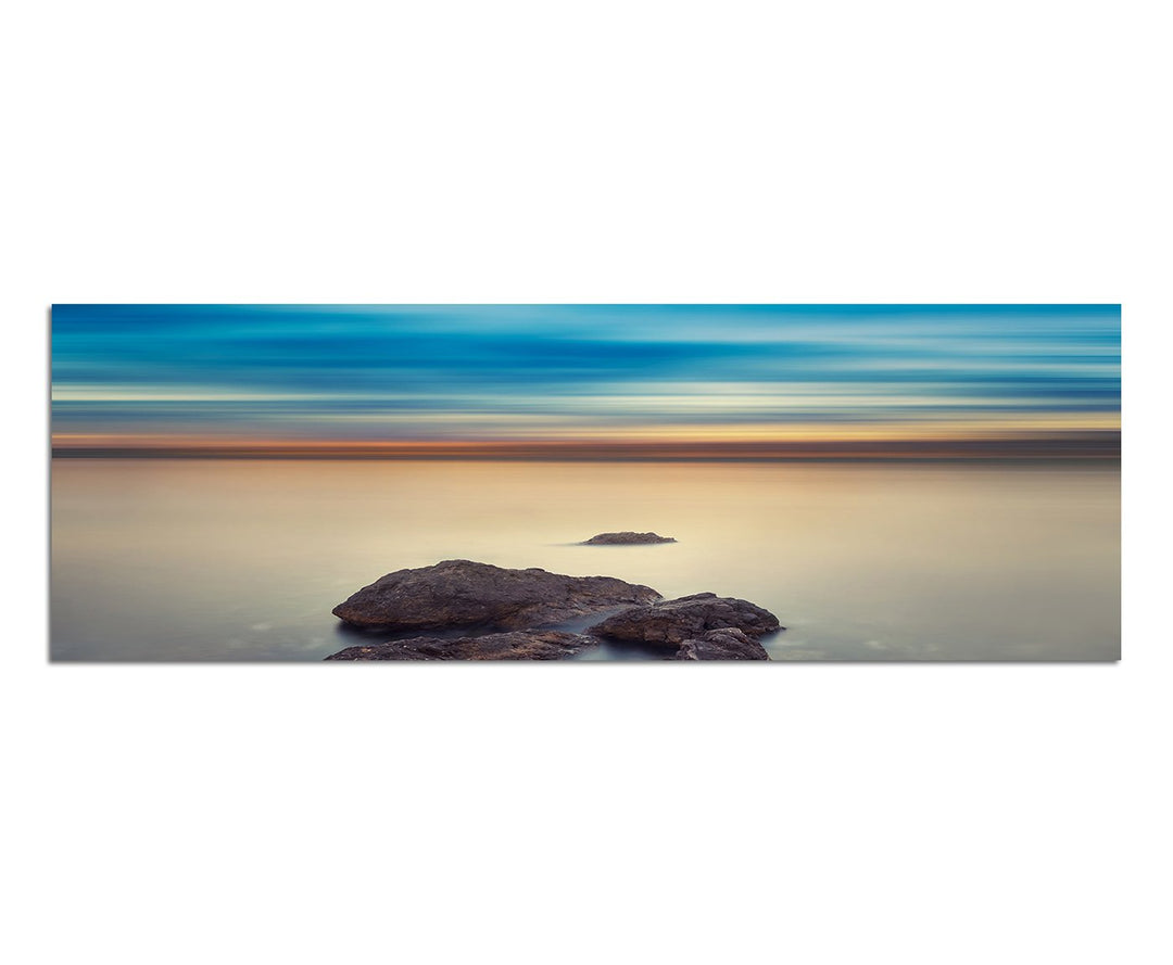 Paul Sinus Art Panoramabild auf Leinwand und Keilrahmen 150x50cm Meer Felsen Abendhimmel mystisch