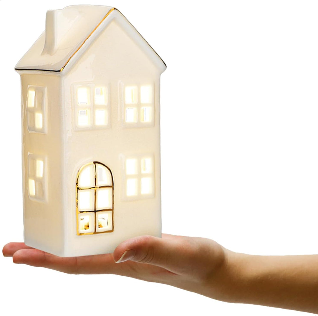 com-four® LED-Haus aus Porzellan - batteriebetriebenes Leuchthaus - weisses glänzendes Deko-Lichthäu