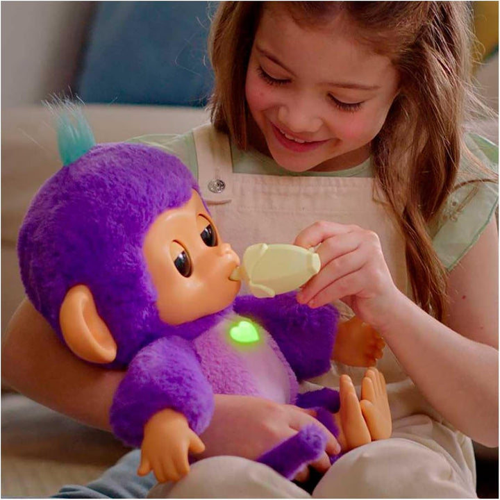 Fingerlings Kümmere dich um Y Mima, interaktiver Plüsch-Affe in Lila, weich und kuschelig, mit +150