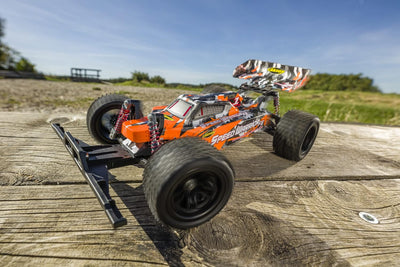 Carson 500404237 - 1:10 FE Speed Warrior 2.4G 100%RTR orange - Ferngesteuertes Auto, RC Buggy, inkl.