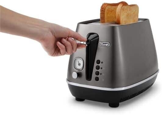De'Longhi CTIN2103.TB Distinta Titanium Toaster, 6 Röststufen, Brötchenaufsatz, modernes Titan-Finis