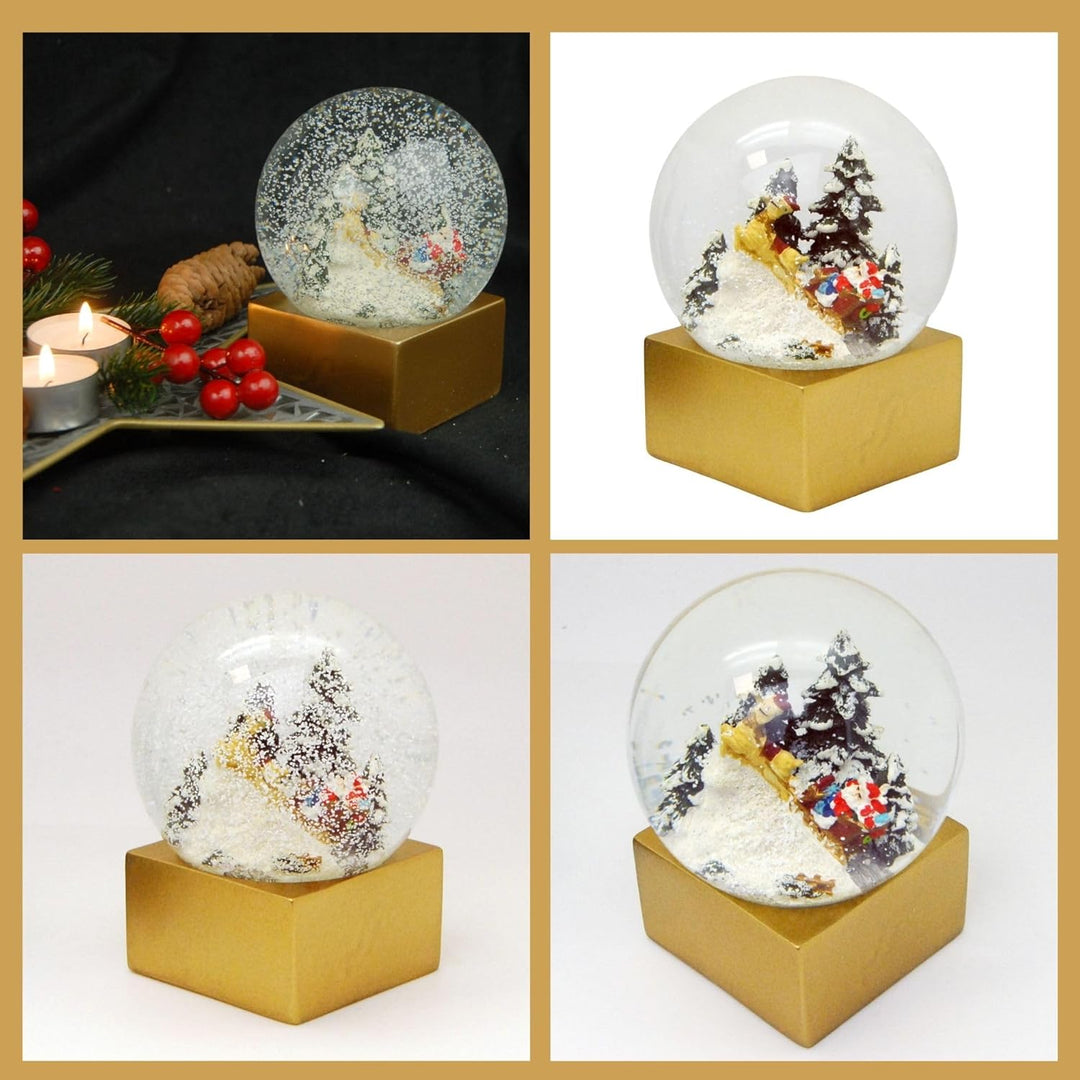 Weihnachts-Schneekugel | Weihnachtsmann mit Geschenken | Farbe rot Gold | 100mm breit, 120mm hoch |