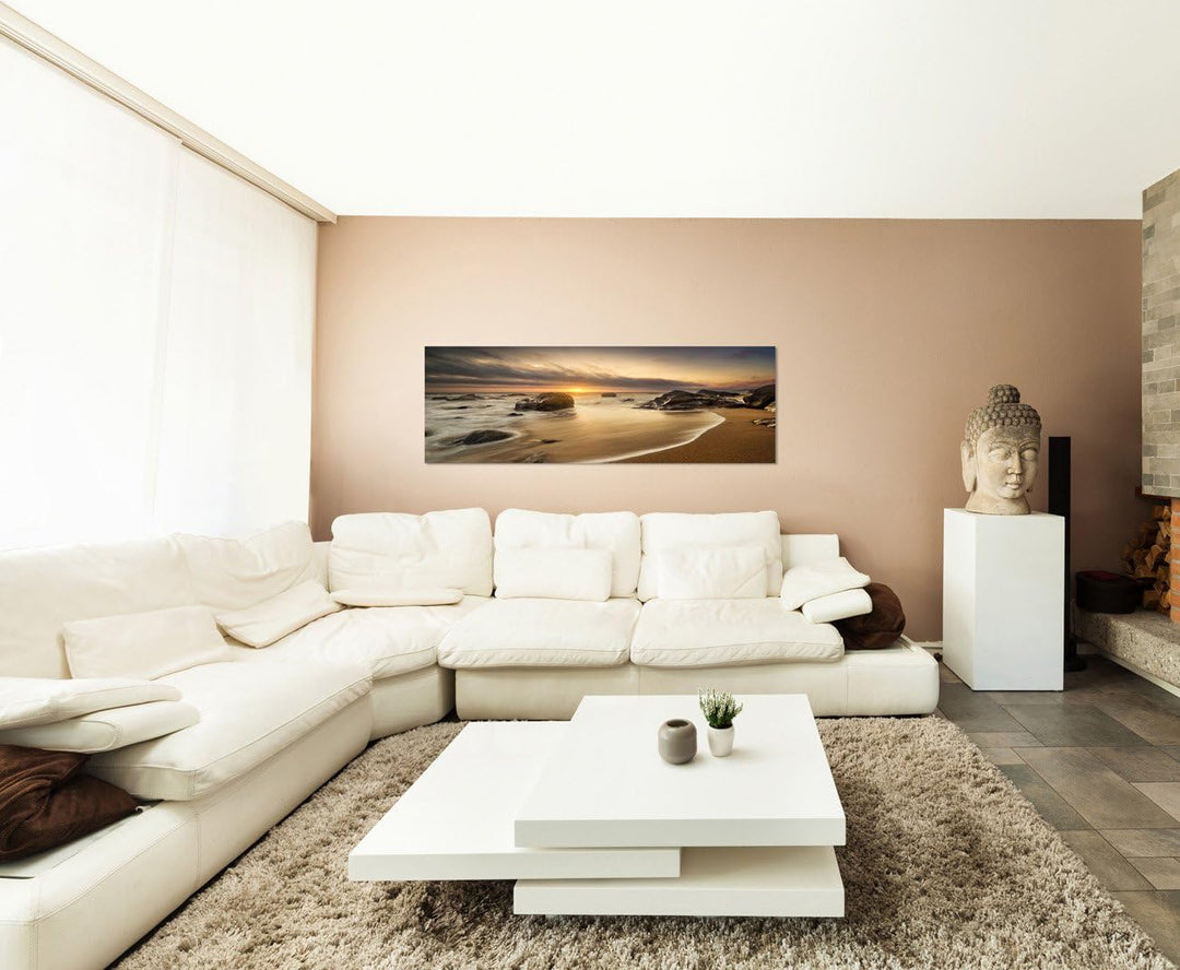 Paul Sinus Art Panoramabild auf Leinwand und Keilrahmen 150x50cm Meer Strand Steine Sonnenaufgang Wo