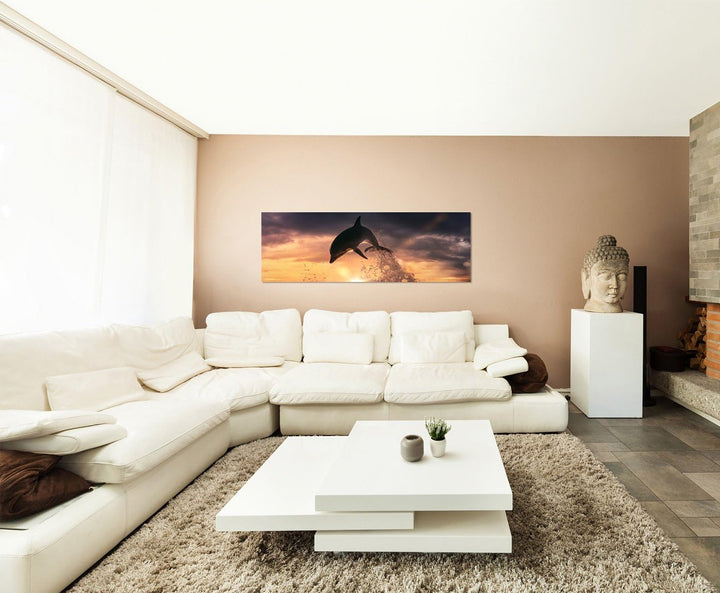 Paul Sinus Art Panoramabild auf Leinwand und Keilrahmen 150x50cm Meer Delfin Sprung Sonnenuntergang