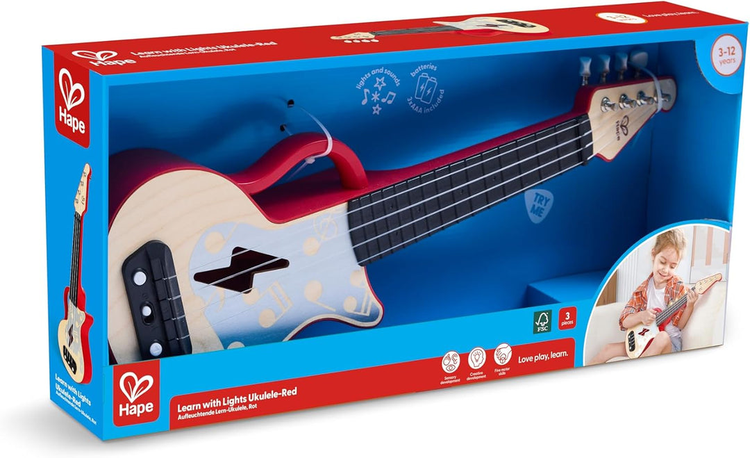 Hape Elektrische Ukulele mit stimmbaren Saiten und Führungslichtern für Kinder ab 3 Jahren, rot