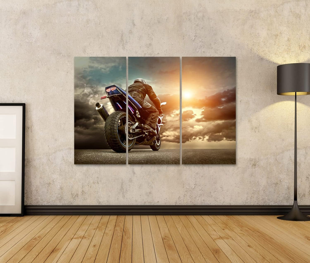 islandburner Bild auf Leinwand Mann Sitzt Auf Dem Motorrad Auf Asphalt Unter Himmel Mit Wolken Bilde