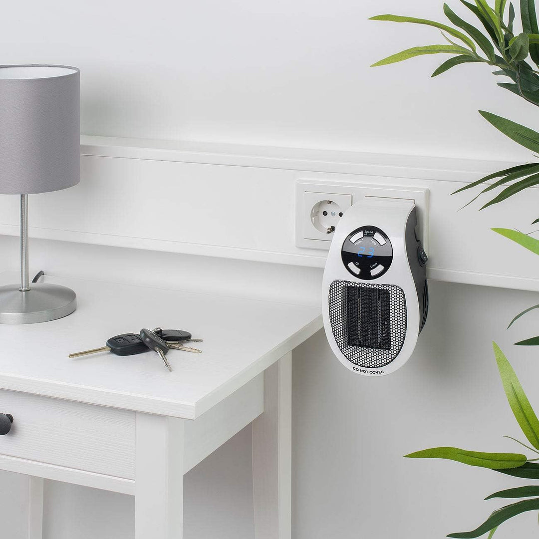 Sichler Haushaltsgeräte Steckdosenheizung: Steckdosen-Keramik-Heizlüfter mit Thermostat, Timer, Disp