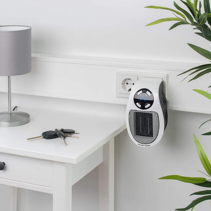 Sichler Haushaltsgeräte Steckdosenheizung: Steckdosen-Keramik-Heizlüfter mit Thermostat, Timer, Disp