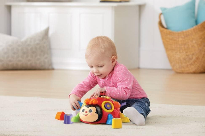 VTech Baby Fröhlicher Lernkäfer – Interaktives Sortierspielzeug zum Lernen von Formen, Farben und Za