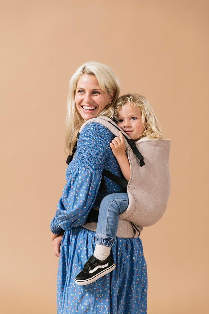 Tula Toddler Linen Babytrage für Kleinkinder, Ergonomische Kindertrage Bauchtrage Rückentrage, Sand