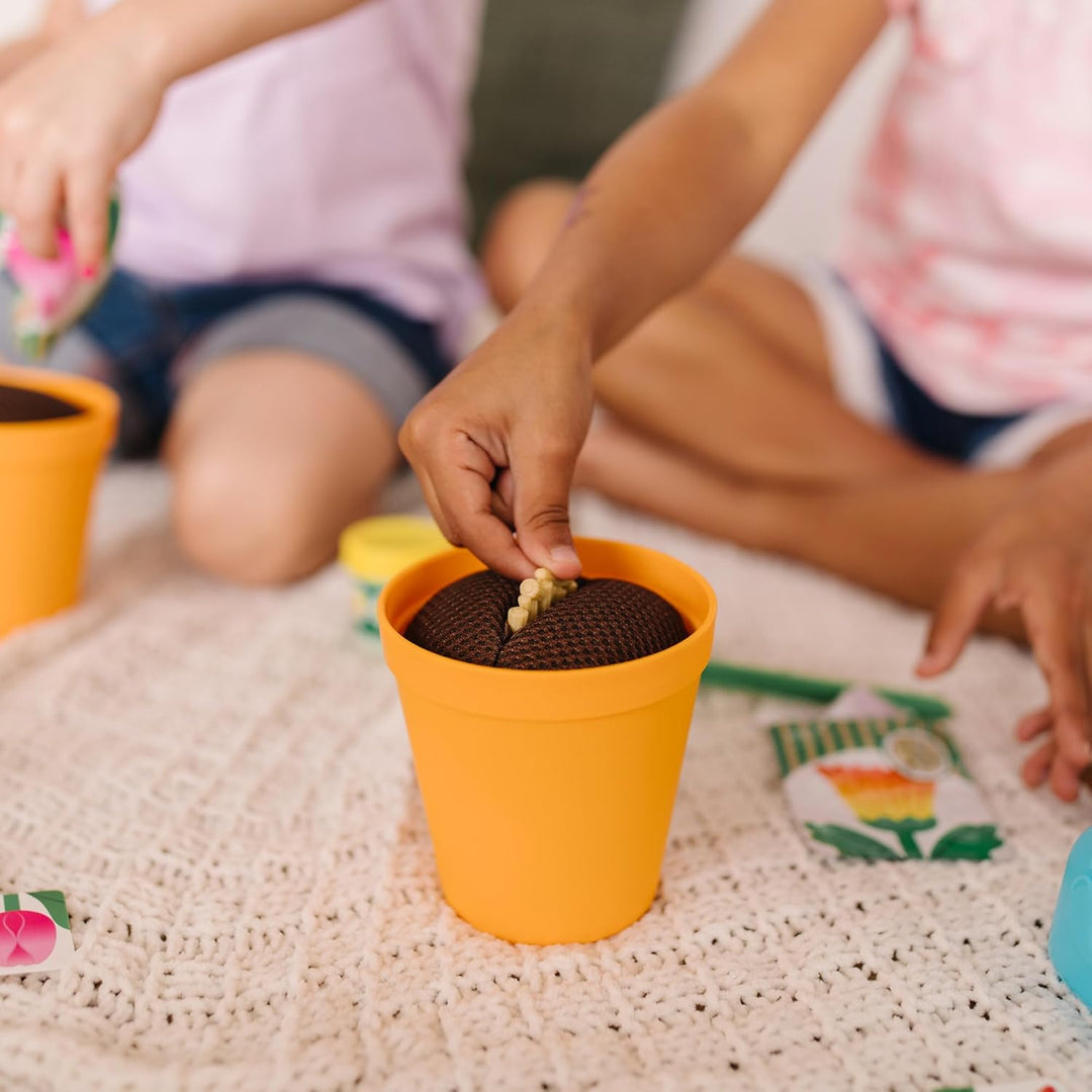Melissa und Doug | Let's Explore | Blumen und Gartenspielset mit Blumen, die ihre Farbe ändern (16 T