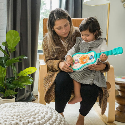 Baby Einstein 12609 Hape Sing & Strum Magic Touch Ukulele, Musikspielzeug aus Holz, mit 6 Melodien u