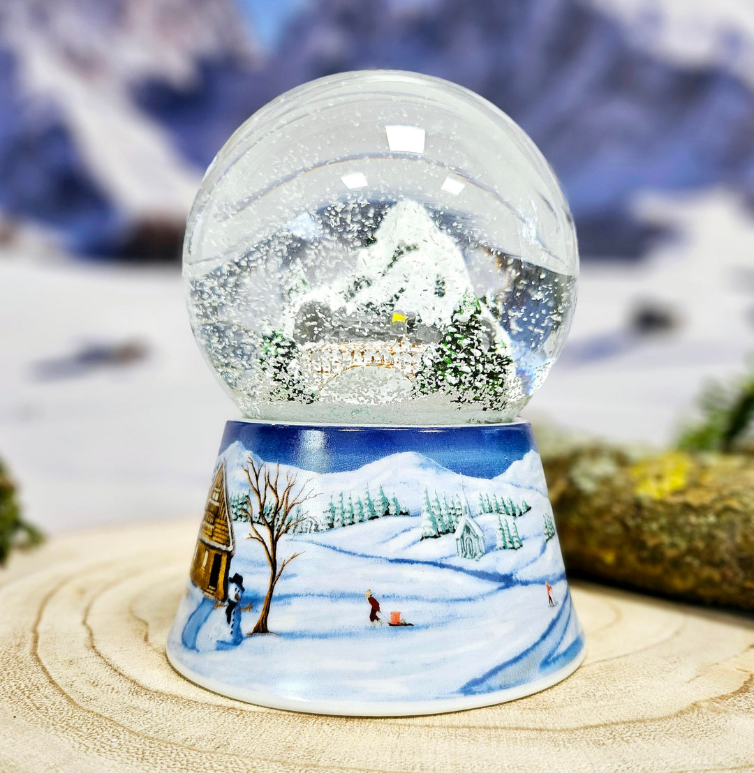 Schneekugel Weihnachten Spieluhr | Winterlandschaft Berge | Sockel Winterlandschaft Mittelblau | Mus