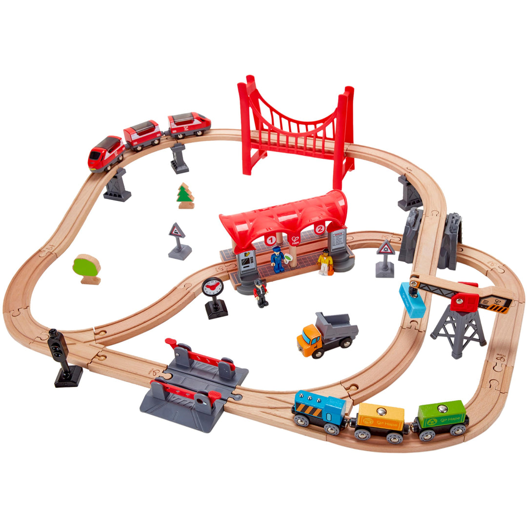 Hape Eisenbahn-Set „Verkehrsreiche Stadt Komplettes Eisenbahn-Set aus Holz zum Themenbereich Stadt f