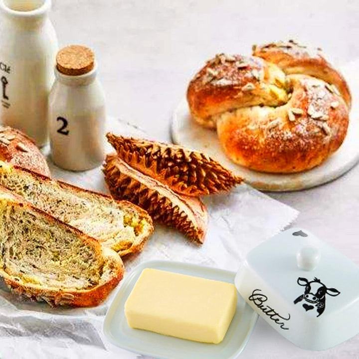 Butterdose mit Griff für 250g Butter, Hochwertige Keramik, Weiss mit Schwarzem Kuhkopfmuster, Porzel