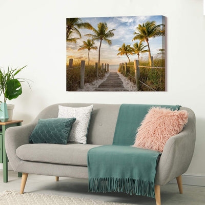 PICANOVA – Bild auf Leinwand Palmenweg zum Meer 80x60cm – Leinwandbild – Premium Leinwanddruck – Wan