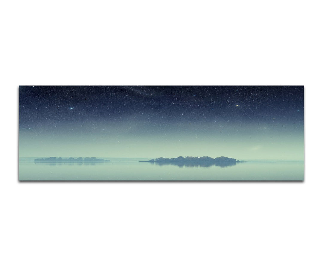 Paul Sinus Art Panoramabild auf Leinwand und Keilrahmen 150x50cm Meer Inseln Nacht Sterne