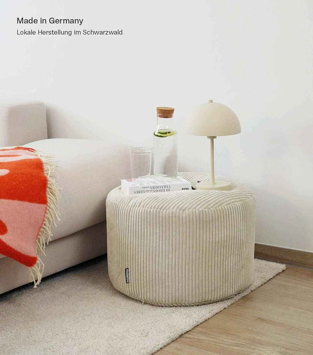 mokebo® Pouf, Hocker o. Sitzhocker aus Cord 40x60 cm 'Der Faule Lenz', Bodenkissen rund in Beige, Fu