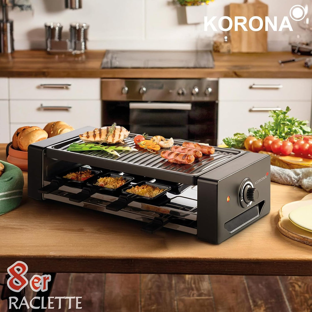 Korona 45070 Raclette für 8 Personen | 8 Pfannen & Spatel | Extra Pfannenablage | Mit antihaftbeschi