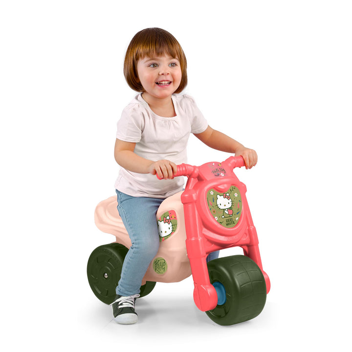 Feber - Hello Kitty Motofeber, Rutscher in Form eines Motorrads mit lustigen Hello Kitty-Aufklebern,